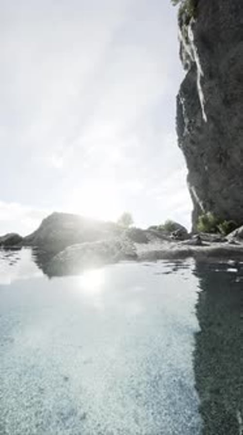 Rocky Cliff Encircling Waterbody