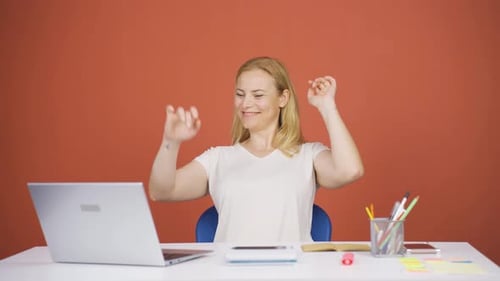 Happy Woman Typing on Laptop, Relaxing in Workplace