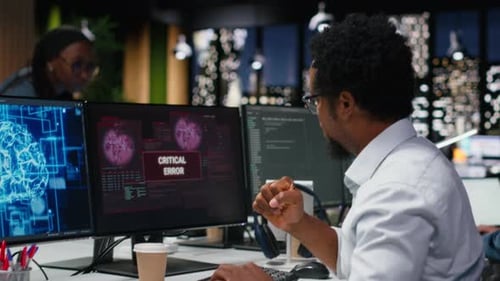 Panicked Admin at Office Desk Thinking How to Fix Critical Error Alert