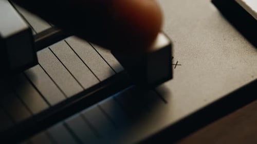 Finger Pushing Volume Slider on Vintage Audio Mixer Device Closeup Macro View