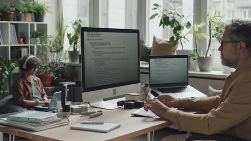 Professional Programmer Working with Codes