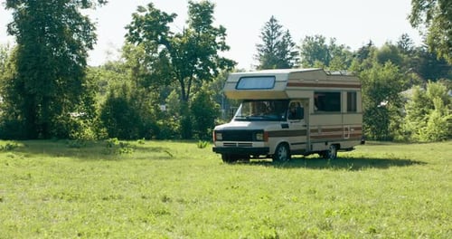 Camper Vehicle of Friends Arrives at the Lake