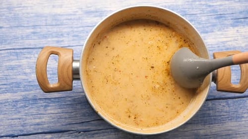 Cooking a Simple Soup at Home Using Fresh Ingredients