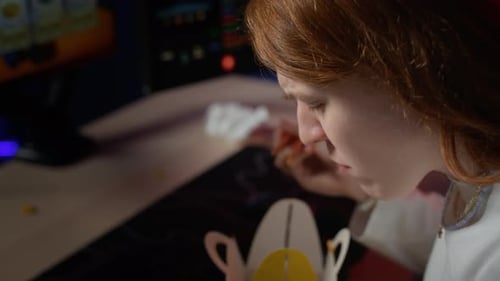 Woman Eating Fast Food and Using Smartphone