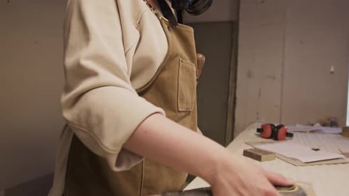 Young Adult Sands Wood in Workshop with Mask