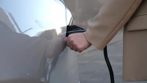 Removing Charging Cable from Electric Car