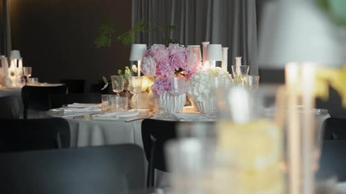 Elegant Wedding Table Setting with Floral Centerpieces