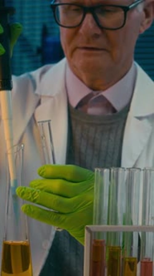 Scientist Working with Test Tubes in a Lab