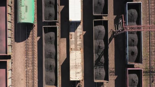 Aerial View of Train Cars and Rail Tracks