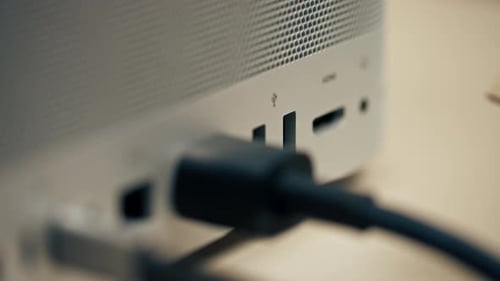 Plugging USB Cable Into Electronic Device