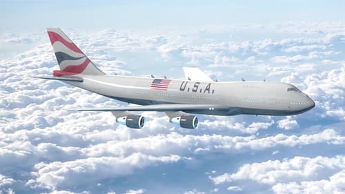 Large Passenger Airplane Flying Above White Clouds