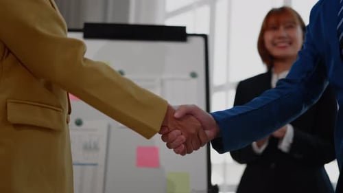 Successful Business Handshake in Modern Workplace