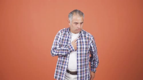 Adult Man Experiencing Severe Chest Pain