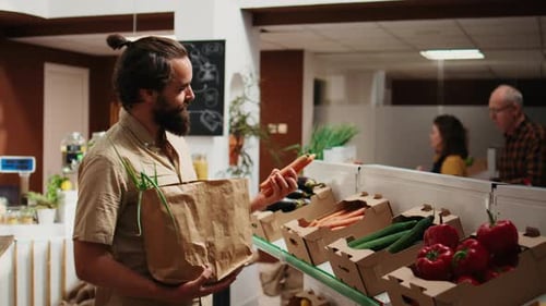 Man Shopping for Fresh Produce at Local Market