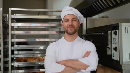Portrait of a Baker in Bakery with Bread and Croissant