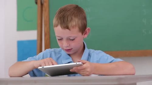 Child at School Using Digital Tablet 4-5