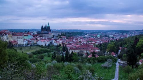 Night to day sunrise timelapse in Prague, Czech Republic as seen from Strahov gardens with a view of