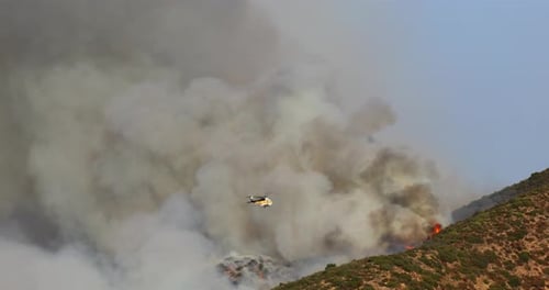 A Helicopter is Responding to the Wildfire in Malibu Los Angeles