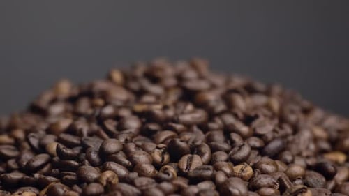 Closeup Heap Roasted Coffee Beans. Beautiful Textured View Perfect Brown Coffee Seeds