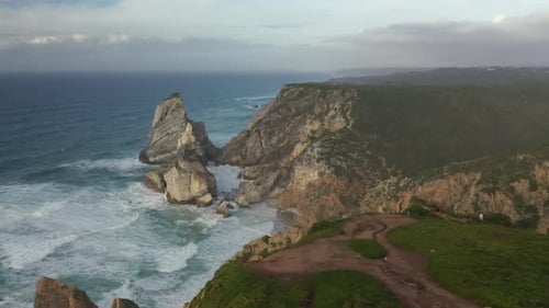 Portugal, Lisbon District, Cliffs surrounding Praia da Ursa beach