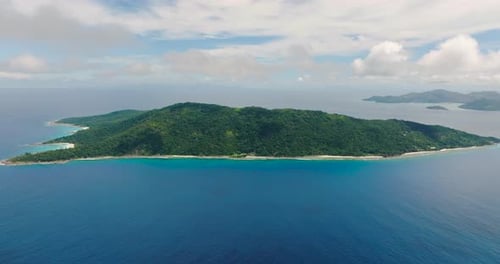 Island with Green Vegetation and Rocky Coastline Seychelles La Digue