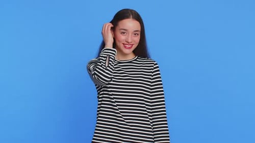 Smiling Young Woman Posing in a Fashion Shoot