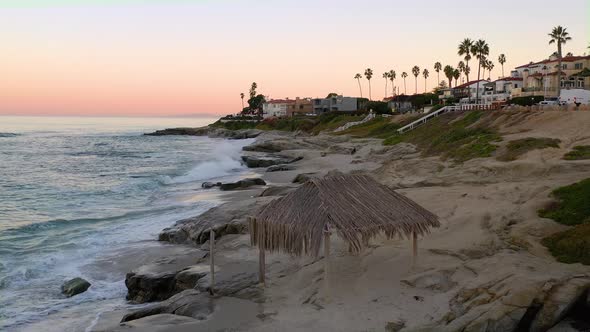 Windansea surf shack in La Jolla, California. Slow drone backwards ...