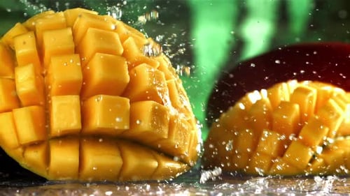 Raindrops Fall on Fresh Mango Filmed on a Highspeed Camera at 1000 Fps