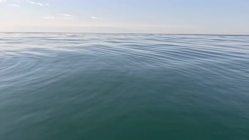 Sea Water Surface Low Angle View Over Clear Azure Sea Water Sun Glare Abstract Nautical Summer Ocean