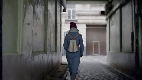 Townswoman in City Lane Rear View of Casual Dressed Lady Walking Alone in Downtown Go to Work