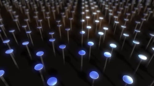 Abstract illuminated poles in a dark setting