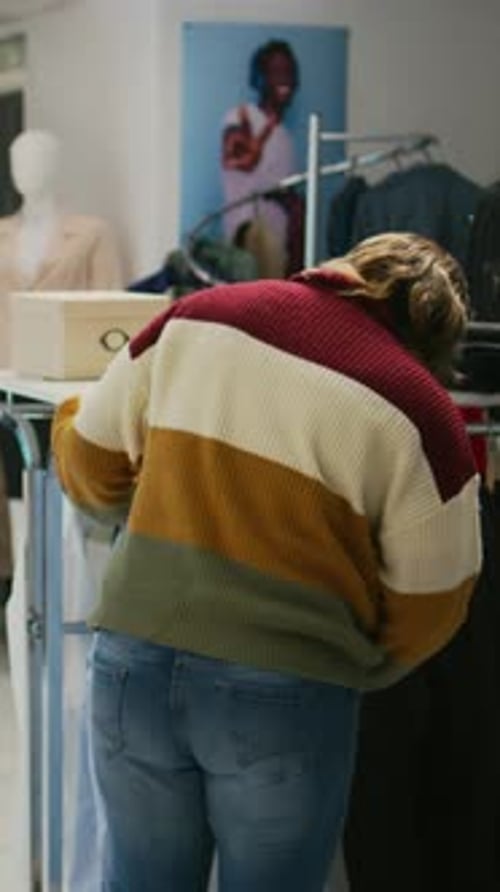 Vertical Video Young Store Customer Shopping for Trendy Clothes