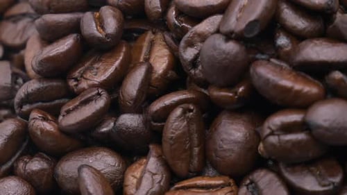 Close Up Roasted Coffee Beans Rotating