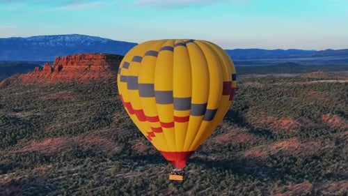 Aerial View Of Hot Air Balloon In Arizona At Sunrise - drone shot