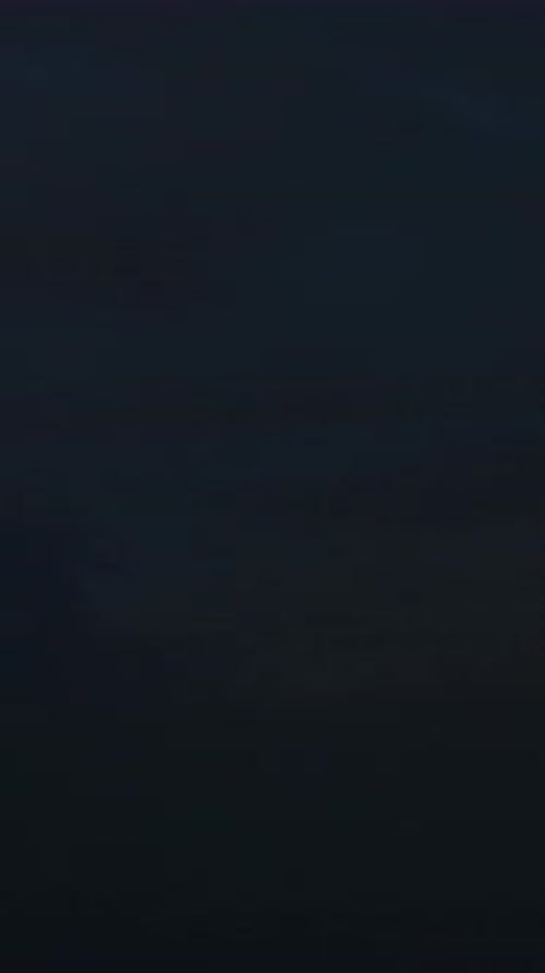 Lightning Strikes During Nighttime Storm in Vertical Video