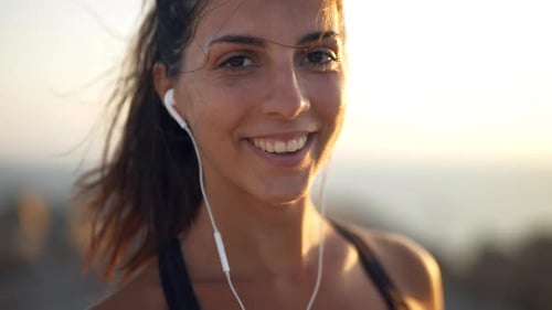 Woman Smiling After Workout at Sunrise