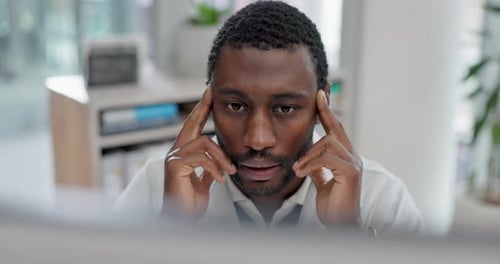 Medical, stress and computer with a doctor black man in the hospital, working on a negative report