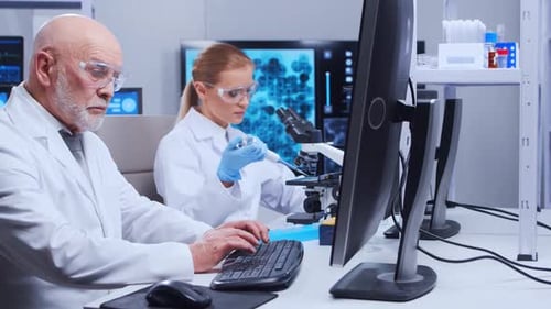 Scientists Working in Modern Medical Research Laboratory