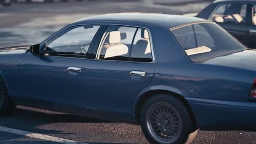 Blue Car Parked with Slow Camera Pan