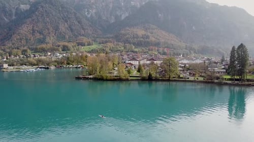 Kayaker enjoying a tranquil mountain lake