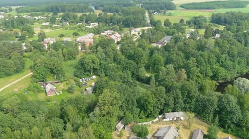 aerial drone view of settlements in the village in Lithuania. shot video. rural housing.
