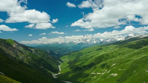 Timelapse of Ushba Peak in Svaneti Greater Caucasus Mountain Range Green Valley Snowcapped Peaks