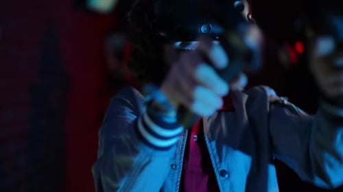 Smiling Young Adult Using a VR Headset