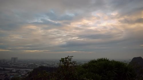 Wide Angle View of Da Nang from high Marble Mountain showing coastal skyline, sea horizon, scattered