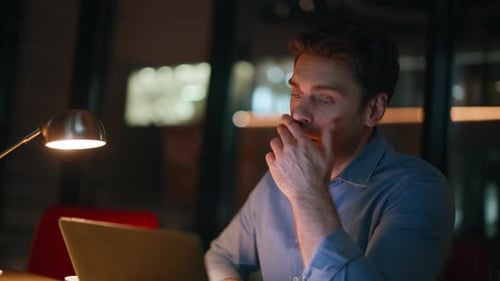 Distant Manager Disappointed Work Problem at Night Apartment Workplace Closeup