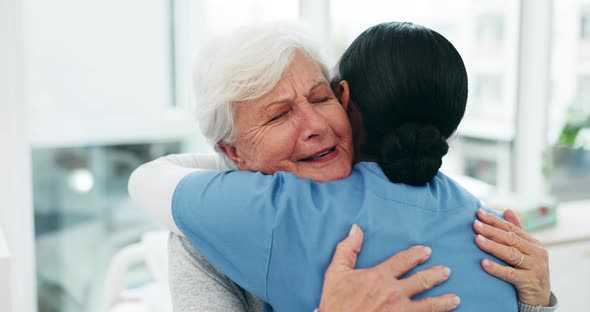 Elderly Patient Hugs Health Care Worker in Hospital, Medical Stock ...