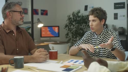 Business Meeting and Presentation in Modern Office