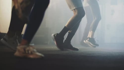 People Jumping in Place at the Gym