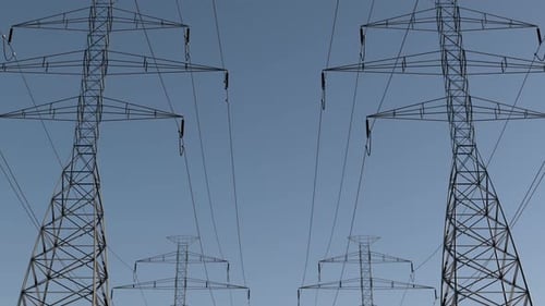 Animated Power Lines and Electricity Towers on Blue Sky