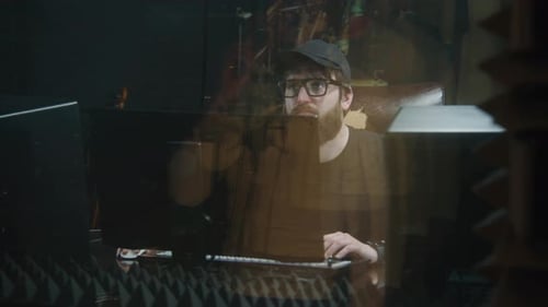 Experienced Audio Engineer Works with Singer